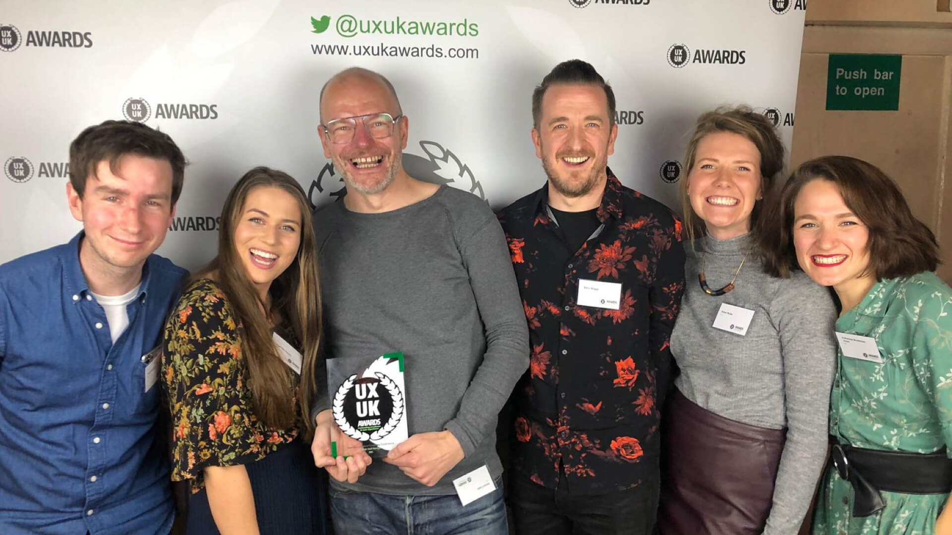 The BBC team clutching the UXUK Award for Best Education or Learning Experience